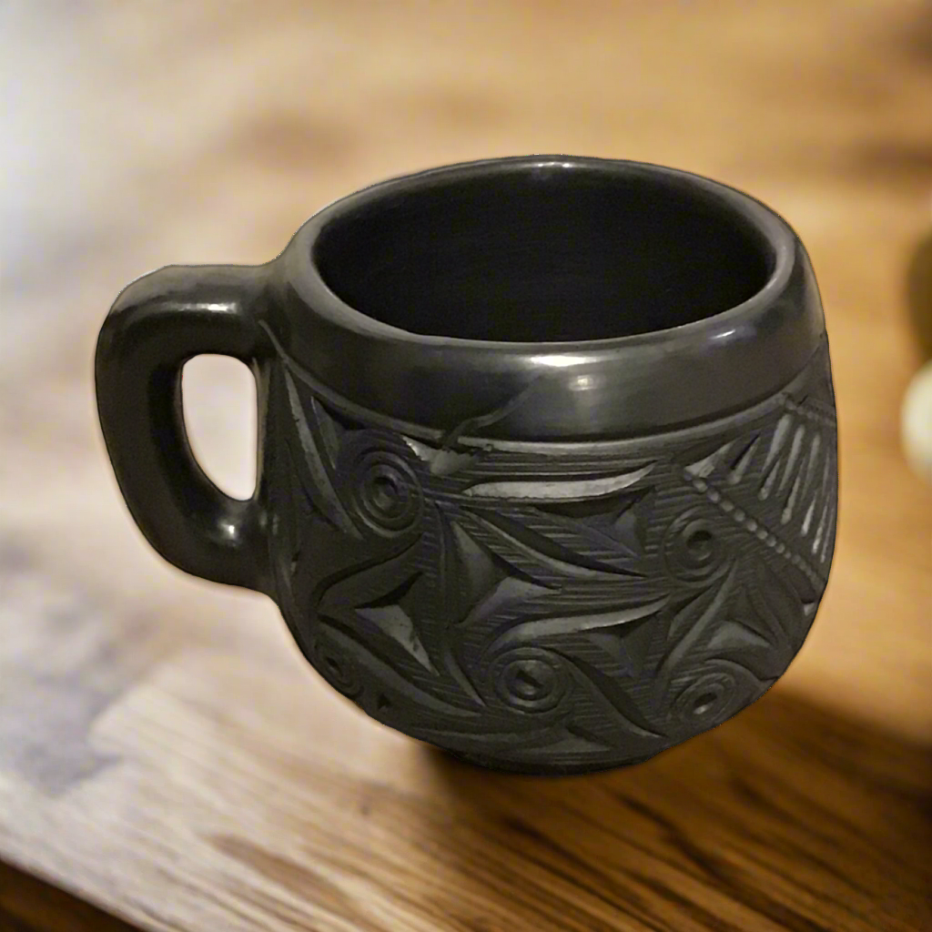 Carved ceramic mug